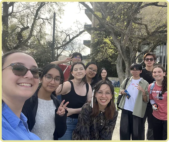 Triceratops Club members gathered under a tree on the UC Davis campus