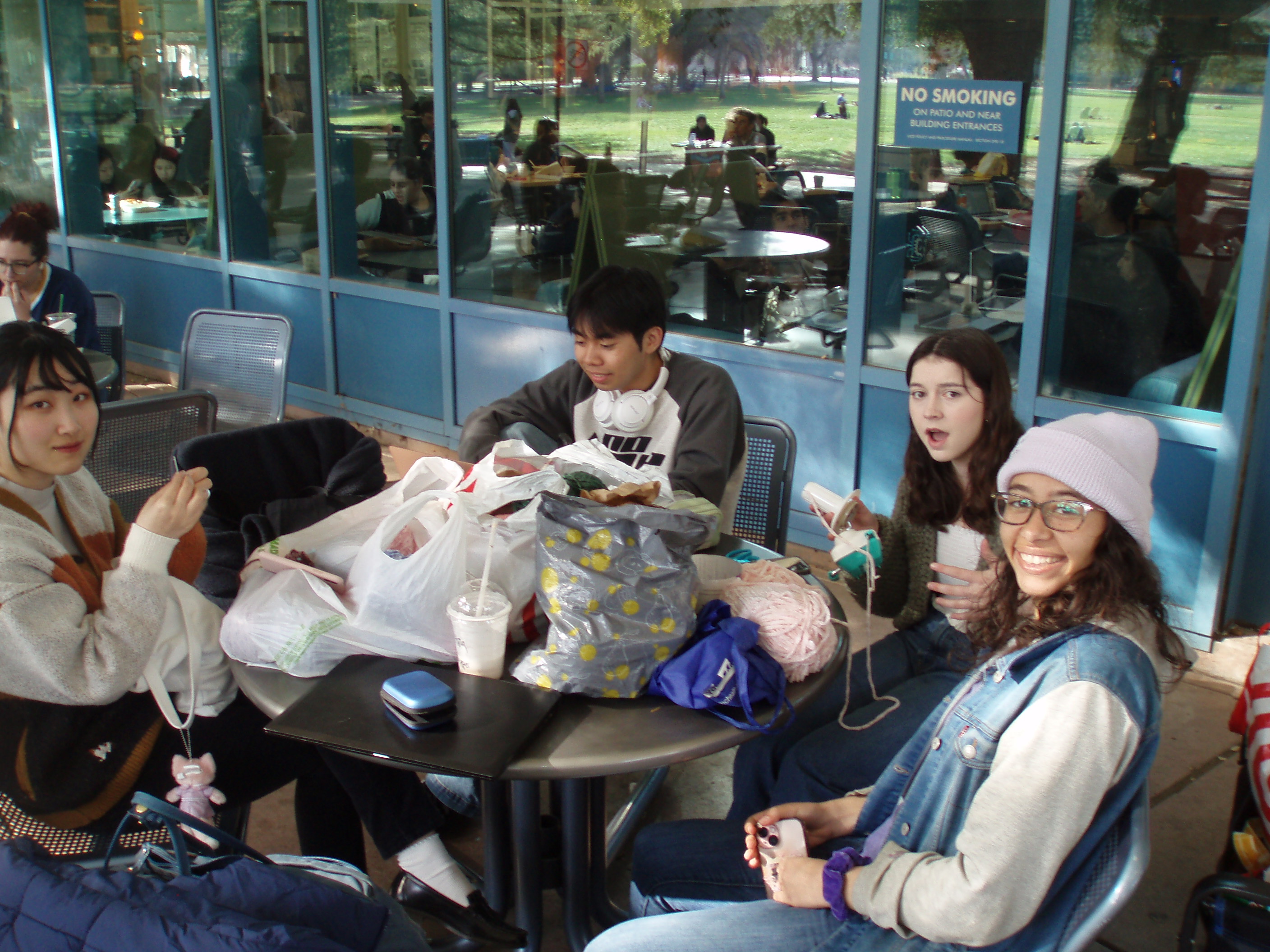 Members sitting together at a campus dining area